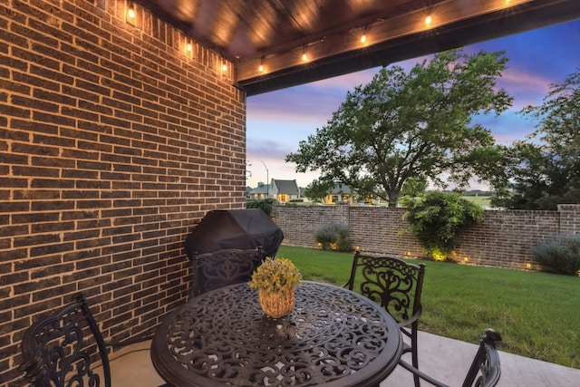 10113 Warberry Trl, Fort Worth, TX 76131 - patio terrace at dusk with grilling area and a patio area