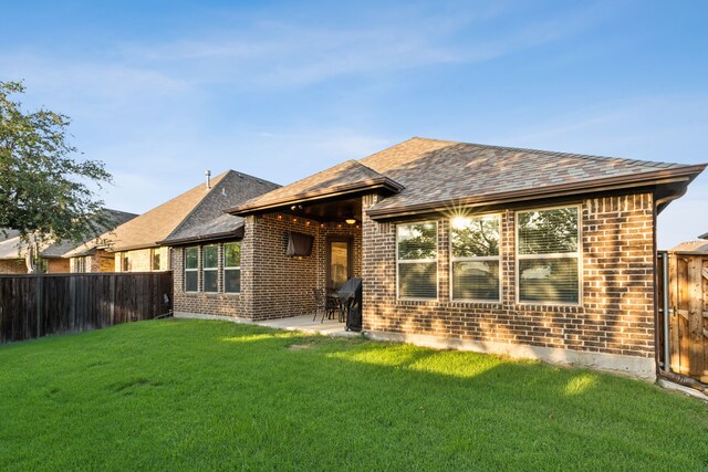 10113 Warberry Trl, Fort Worth, TX 76131 - view of front of house featuring brick siding, a patio, and a shingled roof