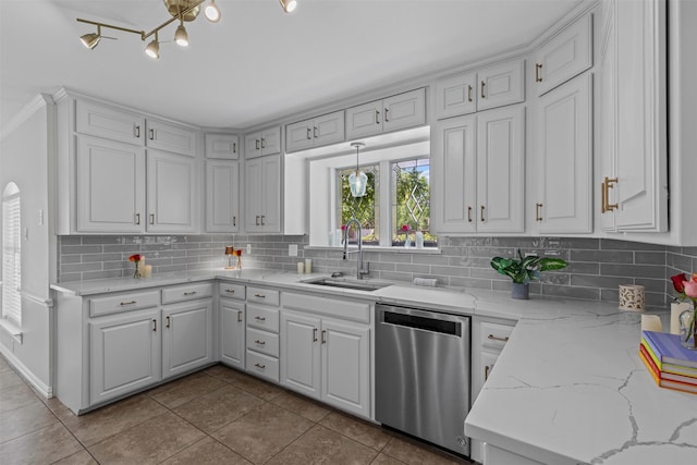 213 Redwood Ct, Keller, TX 76248 - kitchen featuring dishwasher, a sink, dark tile patterned floors, tasteful backsplash, and white cabinetry