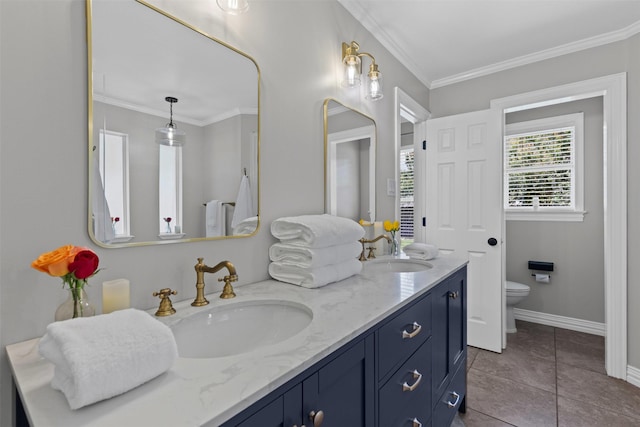 213 Redwood Ct, Keller, TX 76248 - bathroom featuring double vanity, toilet, baseboards, crown molding, and tile patterned flooring