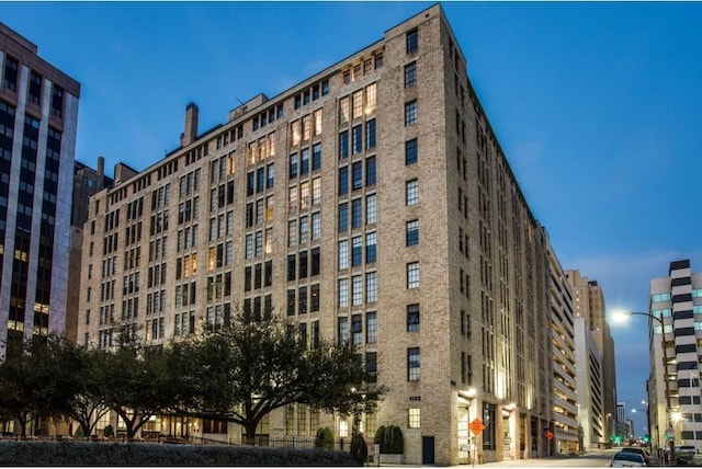 1122 Jackson St Unit 220, Dallas, TX 75202 - view of building exterior featuring a view of city