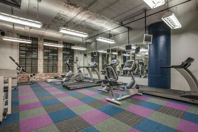 1122 Jackson St Unit 220, Dallas, TX 75202 - exercise room with carpet floors