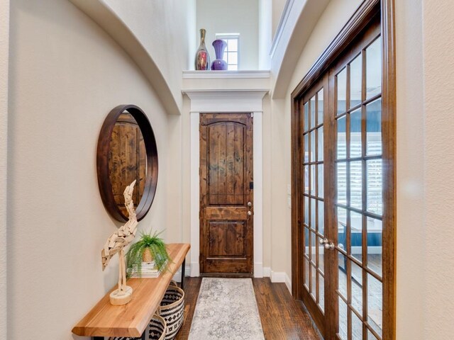 2040 Grassland Dr, Allen, TX 75013 - entrance foyer with french doors, dark wood finished floors, baseboards, and a high ceiling