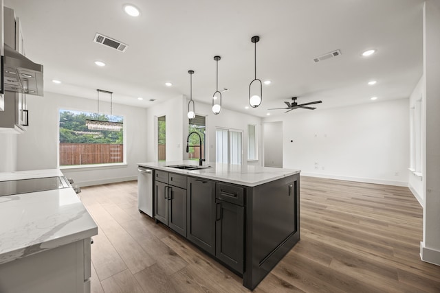 605 Utopia Rd, Tool, TX 75143 - kitchen featuring a sink, stainless steel dishwasher, ceiling fan, light wood finished floors, and recessed lighting