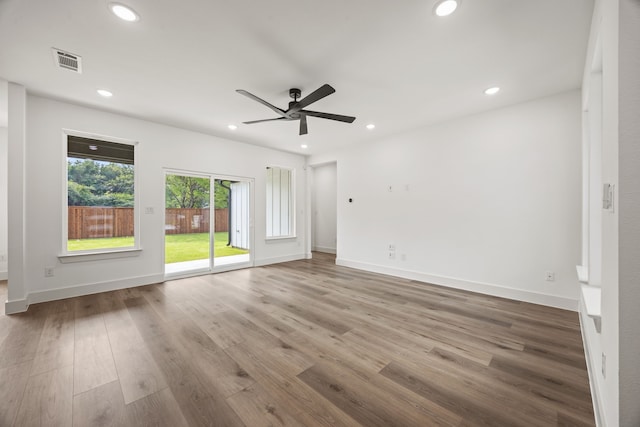 605 Utopia Rd, Tool, TX 75143 - unfurnished room with ceiling fan, recessed lighting, wood finished floors, and baseboards