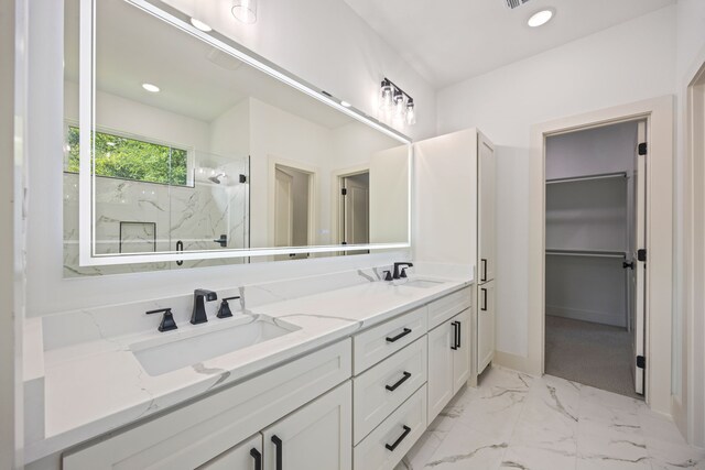 605 Utopia Rd, Tool, TX 75143 - bathroom with a marble finish shower, double vanity, marble look tiles, baseboards, and recessed lighting
