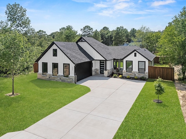 605 Utopia Rd, Tool, TX 75143 - modern inspired farmhouse featuring a shingled roof, stone siding, driveway, a garage, and board and batten siding