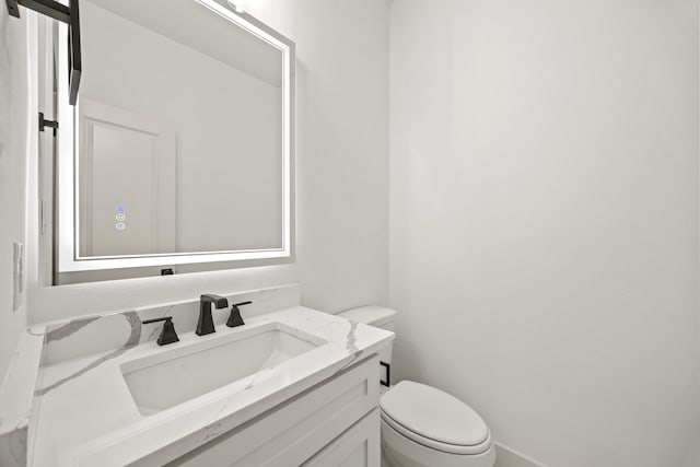 605 Utopia Rd, Tool, TX 75143 - half bath with toilet, vanity, and baseboards