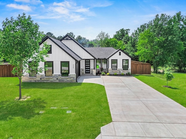 605 Utopia Rd, Tool, TX 75143 - modern farmhouse with stone siding, concrete driveway, board and batten siding, and roof with shingles