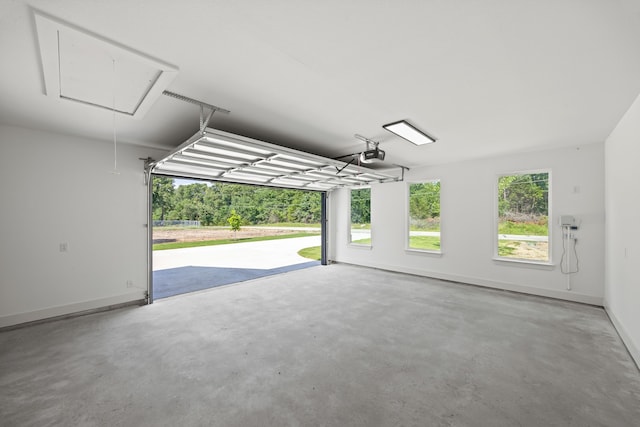 605 Utopia Rd, Tool, TX 75143 - garage with a garage door opener and baseboards