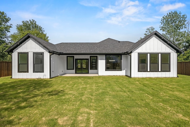 605 Utopia Rd, Tool, TX 75143 - back of property featuring a shingled roof and a patio