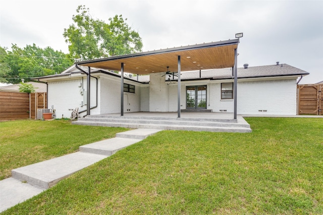 9139 Bretshire Dr, Dallas, TX 75228 - rear view of property featuring ceiling fan, a patio, and brick siding