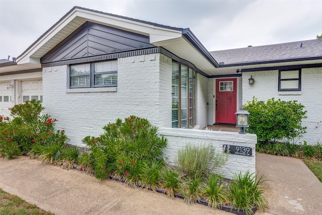 9139 Bretshire Dr, Dallas, TX 75228 - view of front facade with brick siding