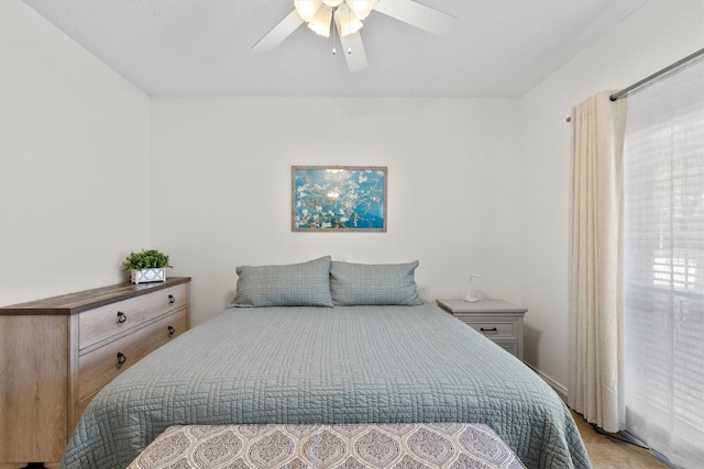 2506 Wedglea Dr Unit 907, Dallas, TX 75211 - bedroom with ceiling fan