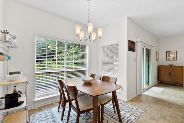 2506 Wedglea Dr Unit 907, Dallas, TX 75211 - dining area featuring plenty of natural light, a chandelier, and baseboards