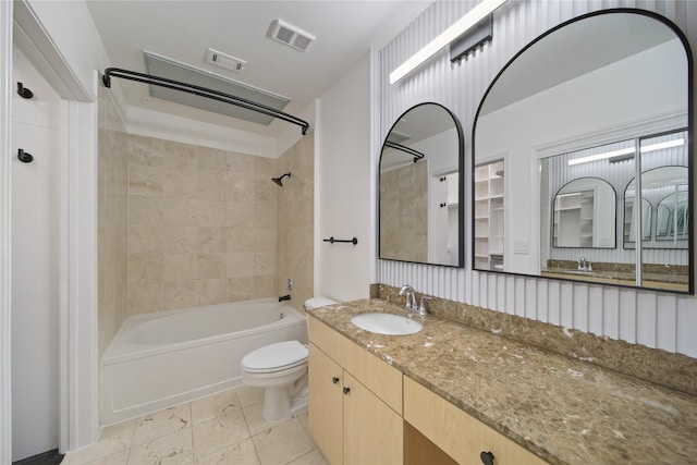 3225 Turtle Creek Blvd Unit 320, Dallas, TX 75219 - full bathroom featuring toilet, vanity, and tub / shower combination