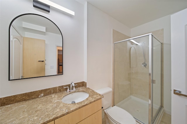 3225 Turtle Creek Blvd Unit 320, Dallas, TX 75219 - full bathroom with vanity, a stall shower, and toilet