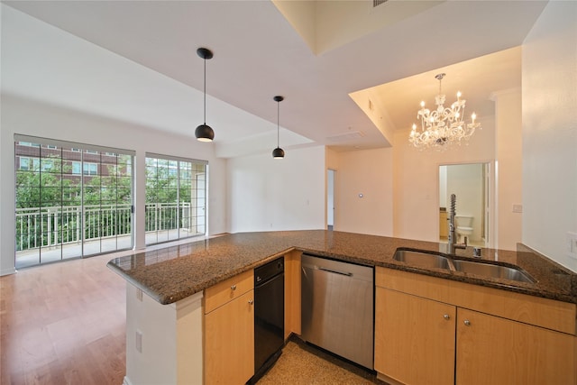 3225 Turtle Creek Blvd Unit 320, Dallas, TX 75219 - kitchen with dishwasher, a sink, dark stone countertops, hanging light fixtures, and a chandelier