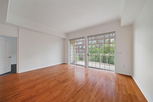 3225 Turtle Creek Blvd Unit 320, Dallas, TX 75219 - unfurnished room with light wood finished floors and baseboards