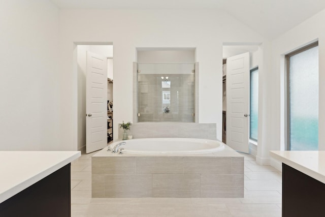 2241 Robin Way, Northlake, TX 76247 - bathroom featuring vanity, a bath, tile patterned flooring, and vaulted ceiling