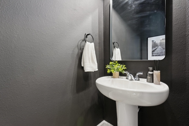 2241 Robin Way, Northlake, TX 76247 - bathroom with a textured wall and a sink
