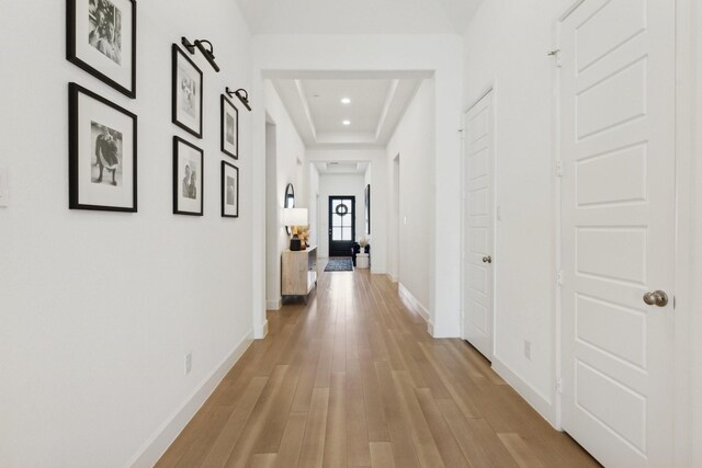 2241 Robin Way, Northlake, TX 76247 - hallway featuring a raised ceiling, light wood-type flooring, baseboards, and recessed lighting