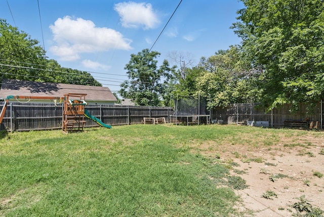 5608 Humbert Ave, Fort Worth, TX 76107 - view of yard featuring a trampoline and a playground