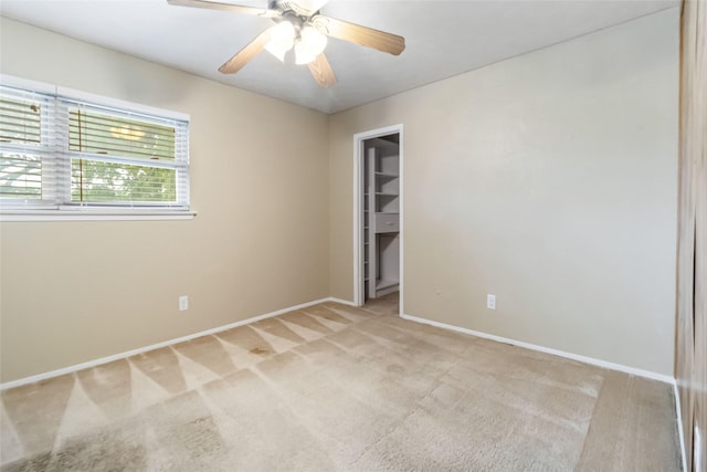 1619 Marquette Dr, Richardson, TX 75081 - unfurnished room with light carpet, a ceiling fan, and baseboards