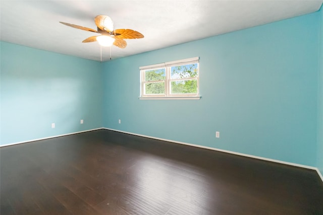 1619 Marquette Dr, Richardson, TX 75081 - unfurnished room with wood finished floors, a ceiling fan, and baseboards