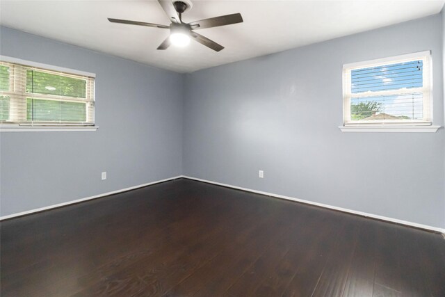 1619 Marquette Dr, Richardson, TX 75081 - unfurnished room featuring dark wood finished floors, baseboards, and ceiling fan
