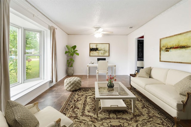 1619 Marquette Dr, Richardson, TX 75081 - tiled living area with a ceiling fan, a textured ceiling, and baseboards