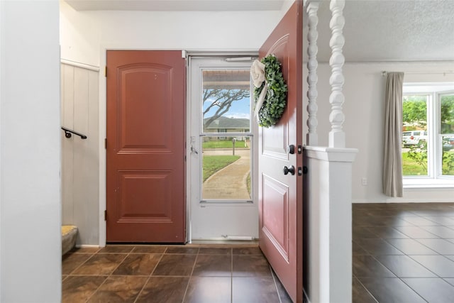 1619 Marquette Dr, Richardson, TX 75081 - entryway featuring dark tile patterned flooring
