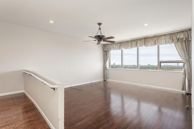 6335 W NW Hwy Unit 1314, Dallas, TX 75225 - spare room with baseboards, plenty of natural light, a ceiling fan, dark wood finished floors, and recessed lighting