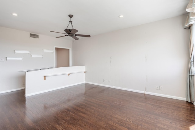 6335 W NW Hwy Unit 1314, Dallas, TX 75225 - unfurnished living room featuring a ceiling fan, dark wood-style floors, baseboards, and recessed lighting