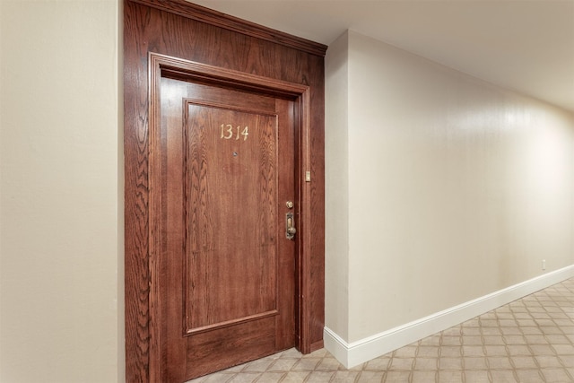 6335 W NW Hwy Unit 1314, Dallas, TX 75225 - detailed view of baseboards and tile patterned floors