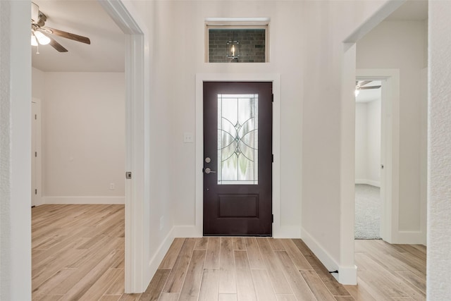 137 Willow Ln, Roanoke, TX 76262 - foyer featuring ceiling fan, light wood-style flooring, and baseboards