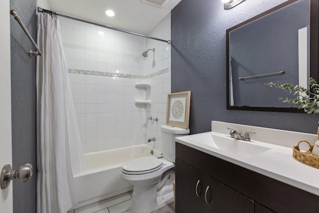713 Loganwood Dr, Royse City, TX 75189 - full bathroom featuring a textured wall, shower / bathtub combination with curtain, vanity, toilet, and tile patterned flooring