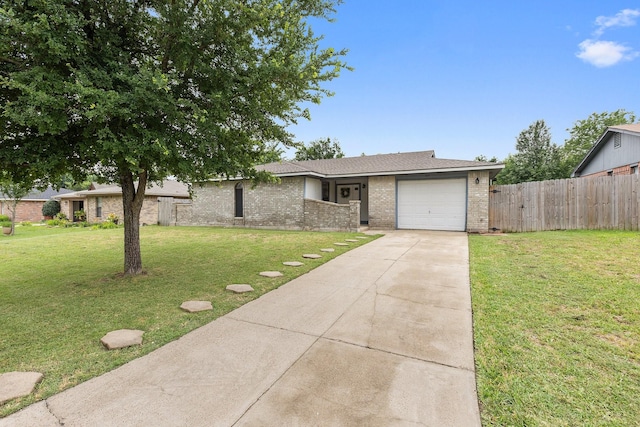 713 Loganwood Dr, Royse City, TX 75189 - view of front of house featuring concrete driveway, a garage, and brick siding