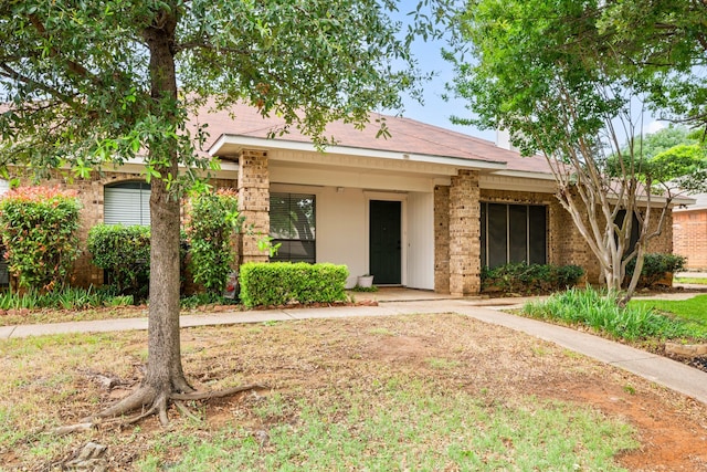 2911 Post Oak Dr, Euless, TX 76039 - view of front facade with brick siding