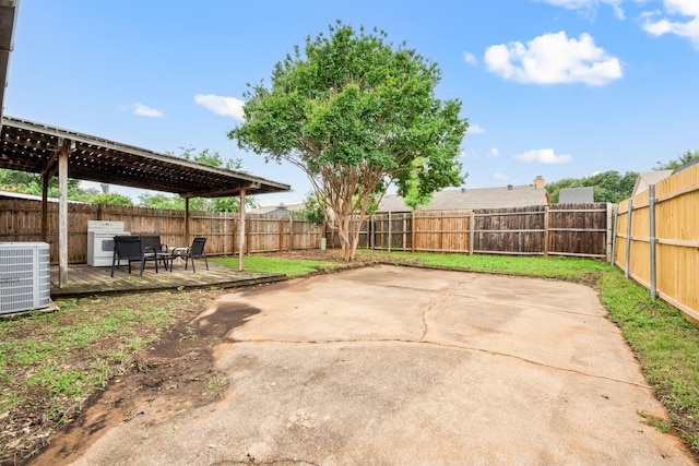 2911 Post Oak Dr, Euless, TX 76039 - fenced backyard featuring central AC unit, a pergola, a patio, and a deck