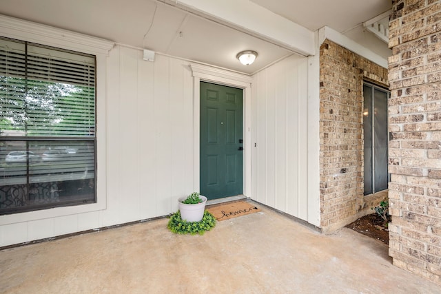 2911 Post Oak Dr, Euless, TX 76039 - property entrance with brick siding and a patio area