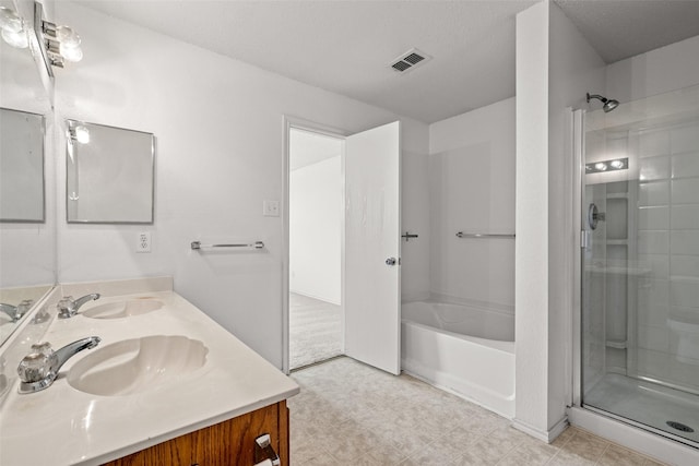 16616 Jasmine Springs Dr, Fort Worth, TX 76247 - bathroom featuring double vanity, a garden tub, and a shower with door