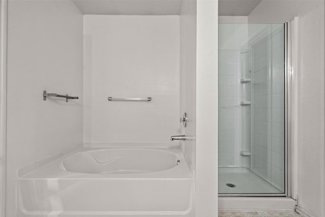 16616 Jasmine Springs Dr, Fort Worth, TX 76247 - bathroom featuring a bath and a stall shower