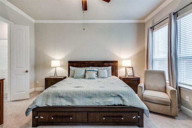 1421 Benavites Dr, Little Elm, TX 75068 - bedroom with light colored carpet, ornamental molding, multiple windows, baseboards, and ceiling fan