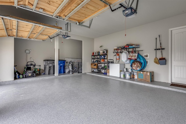 1421 Benavites Dr, Little Elm, TX 75068 - garage with a garage door opener