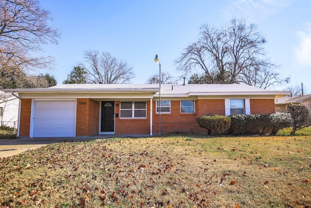 5705 Wheaton Dr, Fort Worth, TX 76133 - ranch-style home featuring a garage, brick siding, concrete driveway, and a front yard