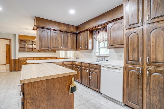 502 Roaring Springs Dr, Joshua, TX 76058 - kitchen with white dishwasher, wood counters, a sink, a center island, and open shelves