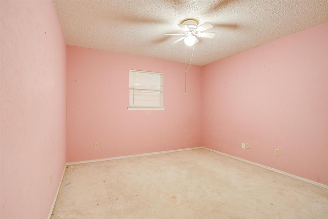 502 Roaring Springs Dr, Joshua, TX 76058 - unfurnished room featuring ceiling fan, a textured ceiling, light carpet, and baseboards