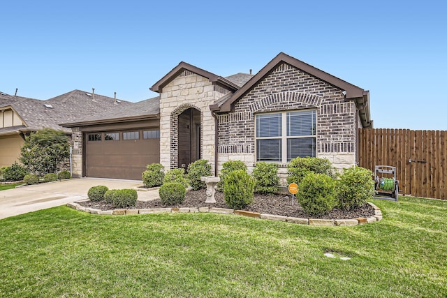 3446 Kirby Ln, Forney, TX 75126 - view of front of home with stone siding, an attached garage, concrete driveway, a shingled roof, and brick siding