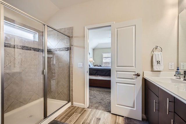 3446 Kirby Ln, Forney, TX 75126 - full bath with vanity, wood finished floors, a stall shower, ensuite bathroom, and vaulted ceiling